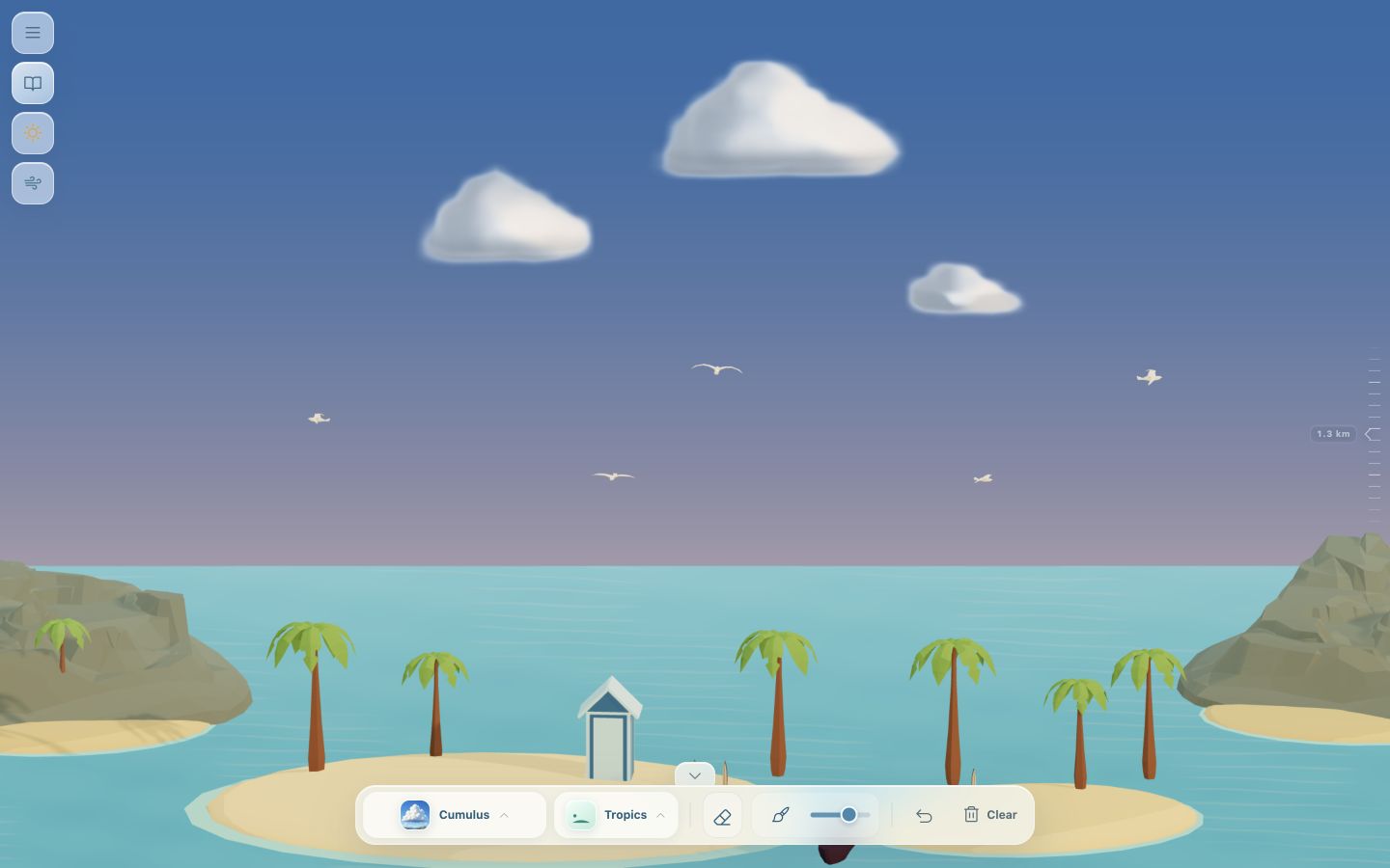 Clouds catch the warm sunset over a tropical island